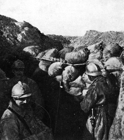 Enemies in the same trench during WWI, French and German soldiers separated only by a wall of sandbags by French Photographer